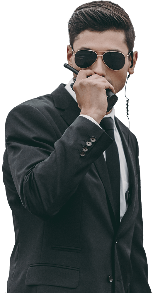 Handsome Bodyguard In Sunglasses Talking By Portab 2022 12 16 16 34 29 Utc.png